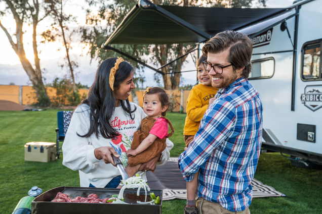 Family doing bbq at campsite