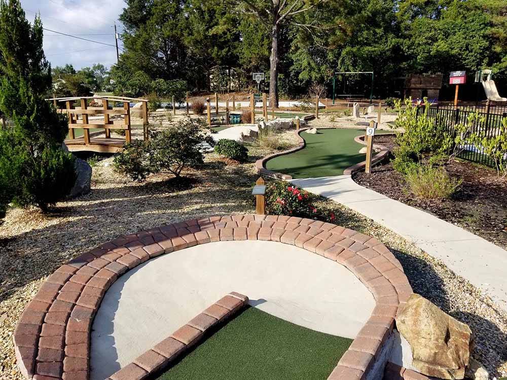 The mini golf course at RALEIGH OAKS RV RESORT & COTTAGES