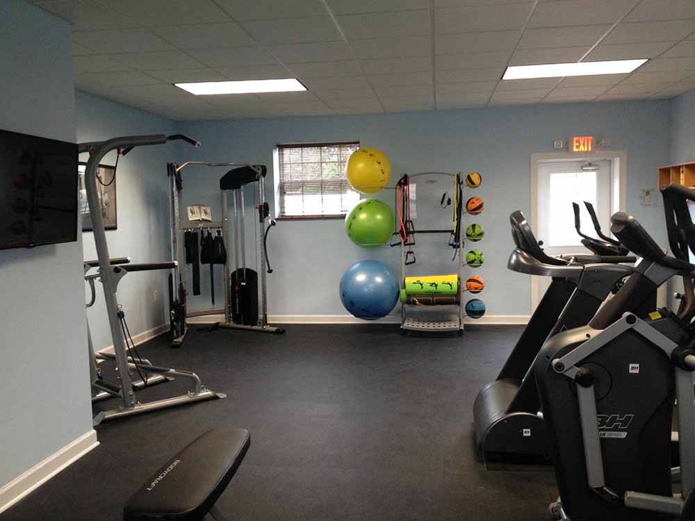 The inside of the exercise room at RALEIGH OAKS RV RESORT & COTTAGES