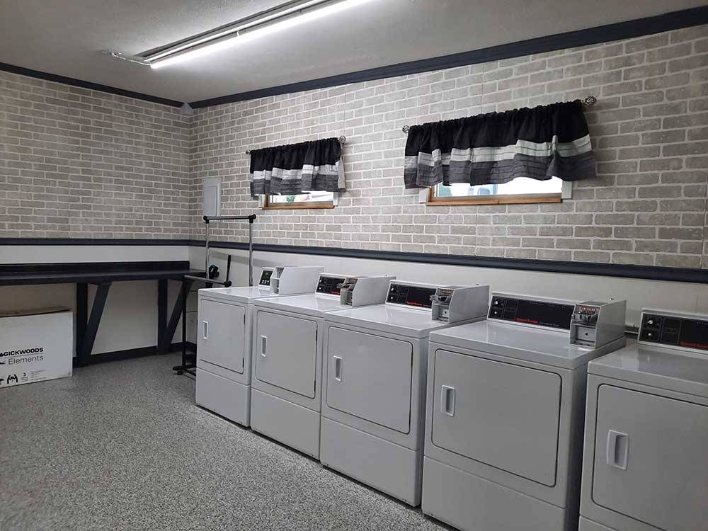 Laundry facilities for guests at COLUMBUS WOODS-N-WATERS KAMPGROUND