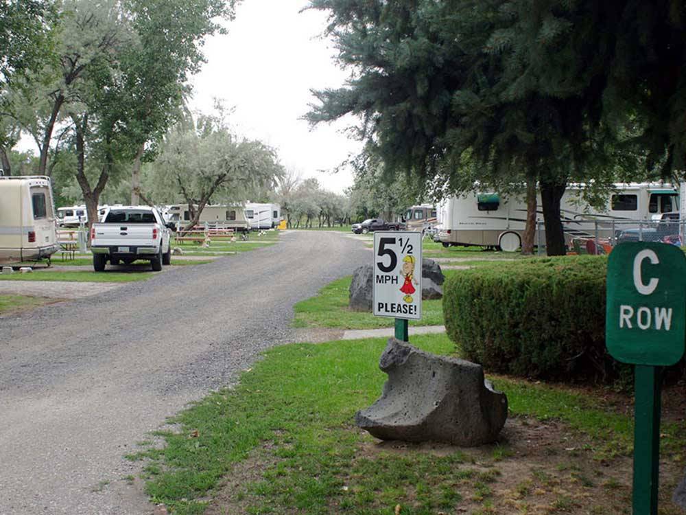 Trucks and RVs camping at SNAKE RIVER RV PARK AND CAMPGROUND