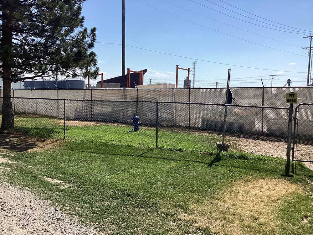 The fenced in pet area at SNAKE RIVER RV PARK AND CAMPGROUND