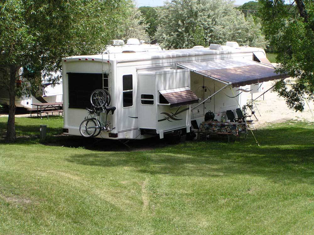 Trailer at campground with bikes at DEER PARK