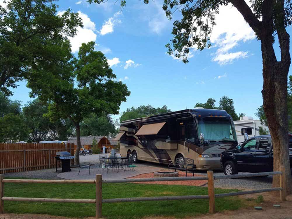 RV and truck at campsite at GRAND JUNCTION KOA