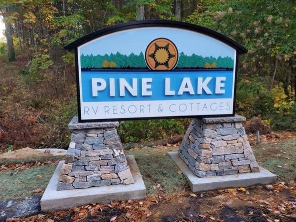 Sign proclaiming Pine Lake Resort and Cottages at PINE LAKE RV RESORT & COTTAGES