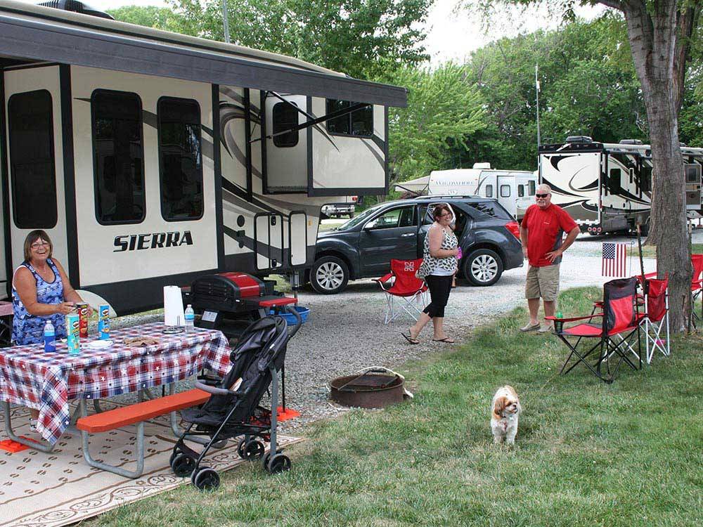 People camping in RVs and trailers at CAMP A WAY RV PARK