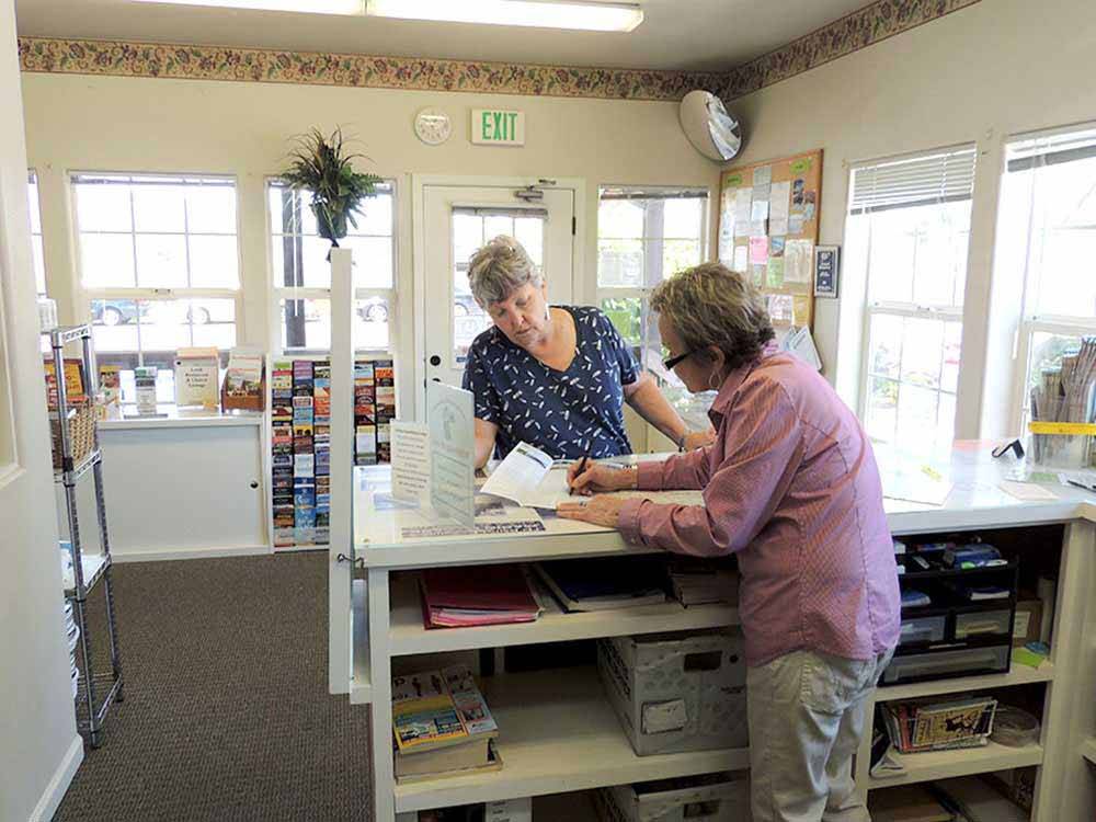 Two women at campground lodge office at MARIN RV PARK