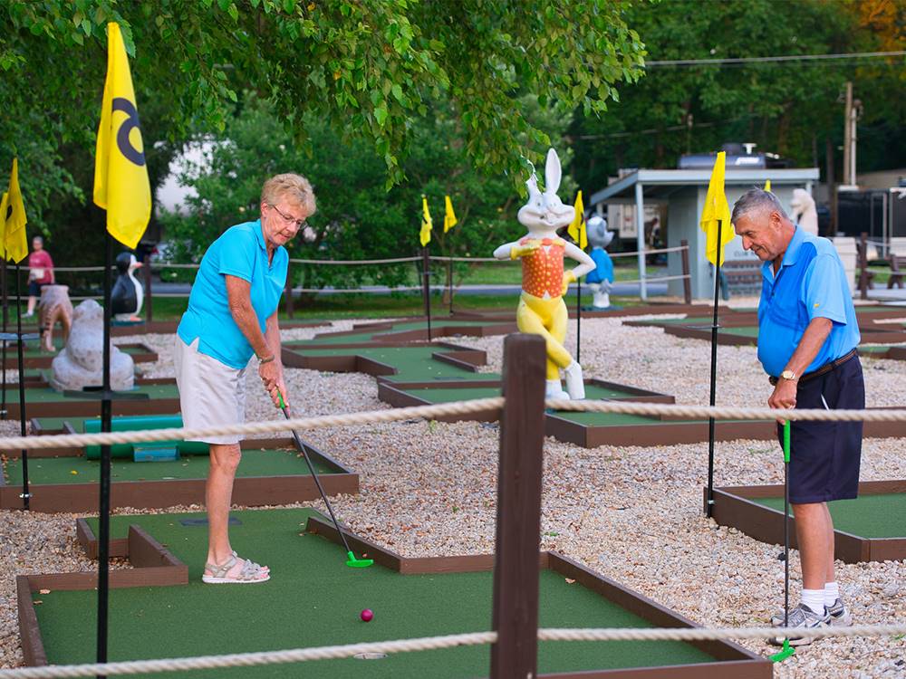 Campers try the miniature golf course at GETTYSBURG CAMPGROUND