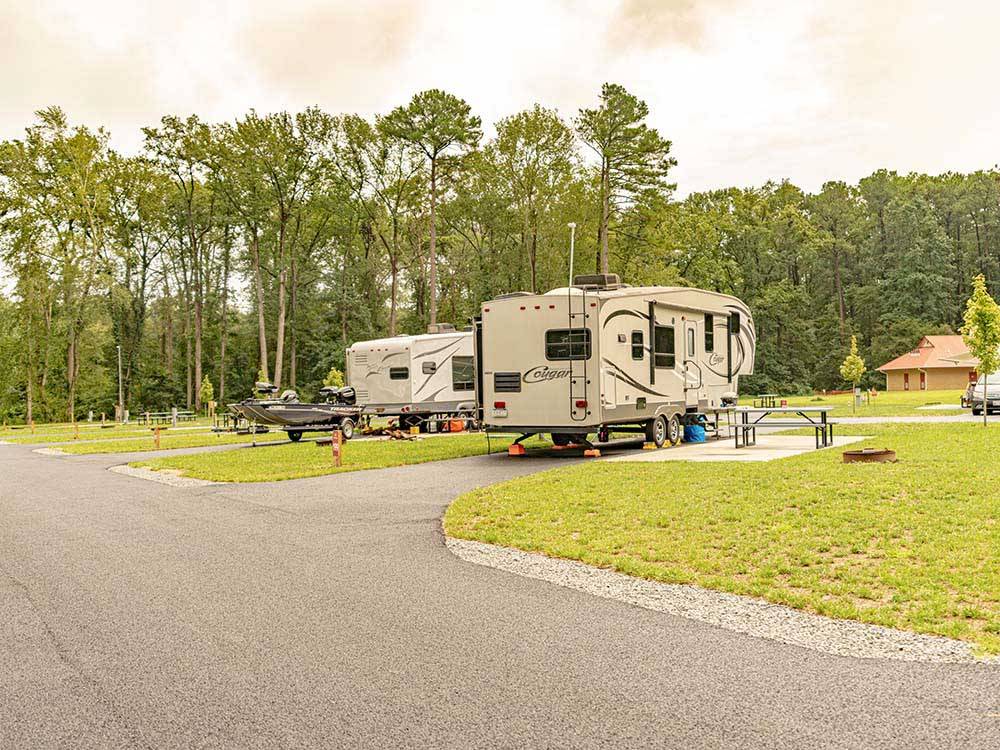Two travel trailers parked in paved sites at SUN OUTDOORS OCEAN CITY GATEWAY