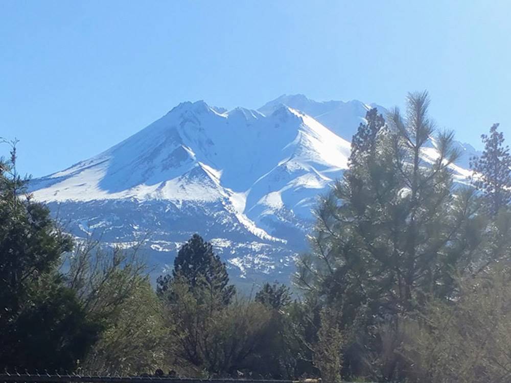 Dramatic view of mountain capped with snow at FRIENDLY RV PARK