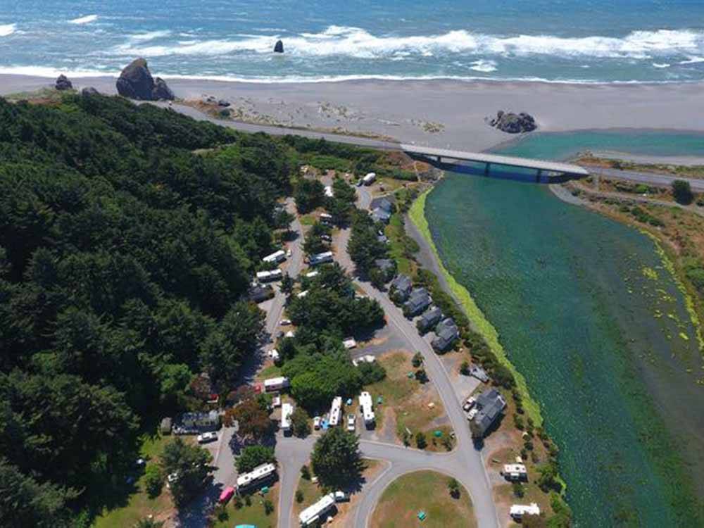 Aerial view of the river and campsites at TURTLE ROCK RV RESORT