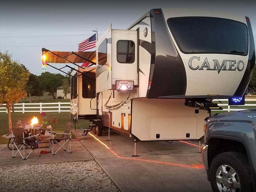Trailer camping at campsite at BUCKHORN LAKE RESORT