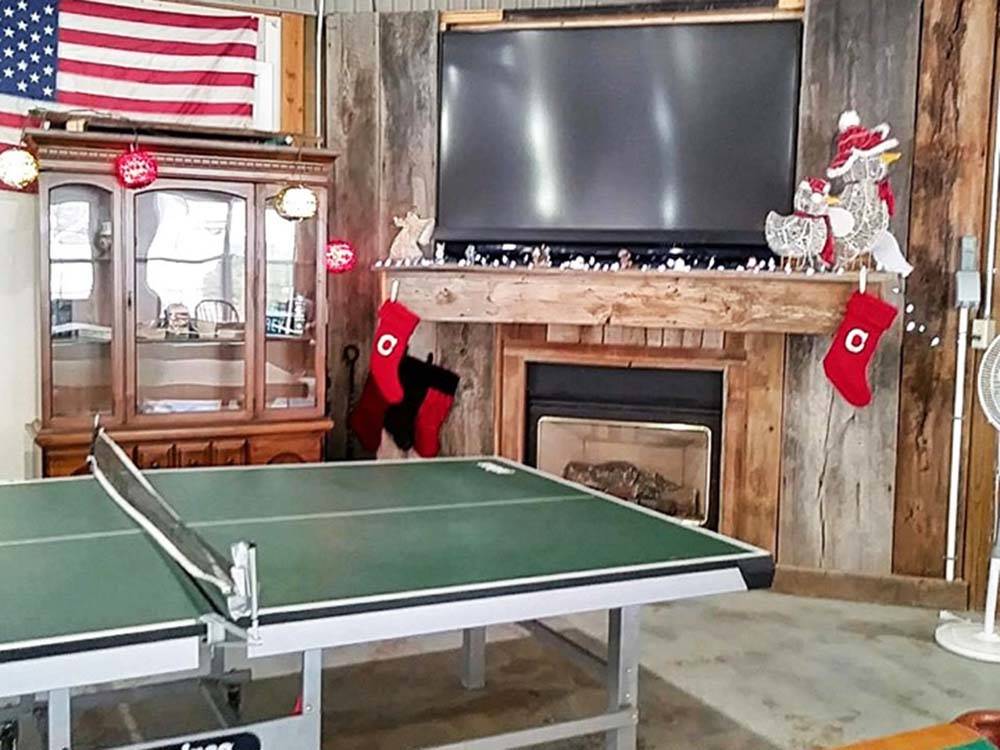 A ping pong table in the rec room at RUTLEDGE LAKE RV RESORT