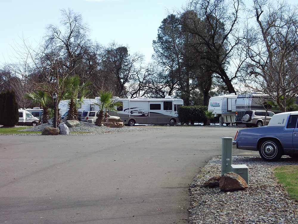 A paved road leading to the RV sites at JGW RV PARK
