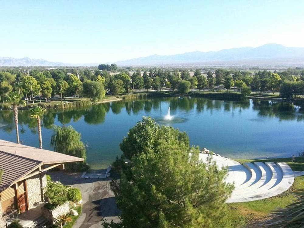 Lake with water fountain in the middle at LAKESIDE CASINO & RV PARK