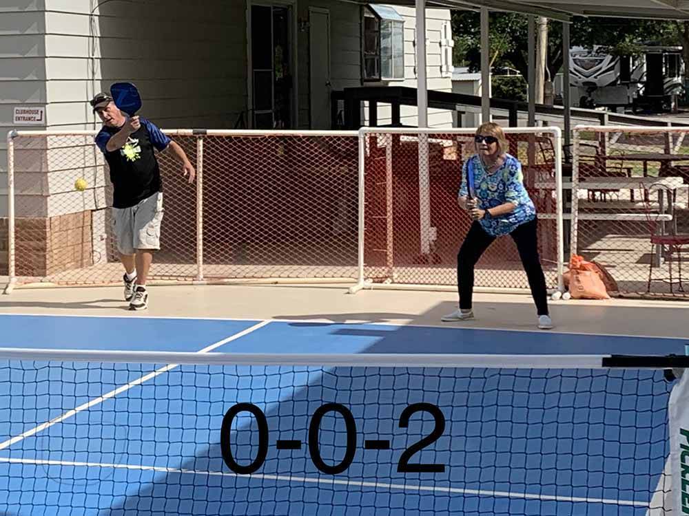 People playing pickleball at SUNNY ACRES RV PARK