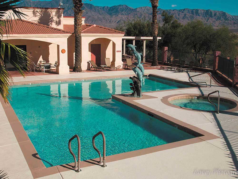 Swimming pool and spa at DESERT SKIES RV RESORT