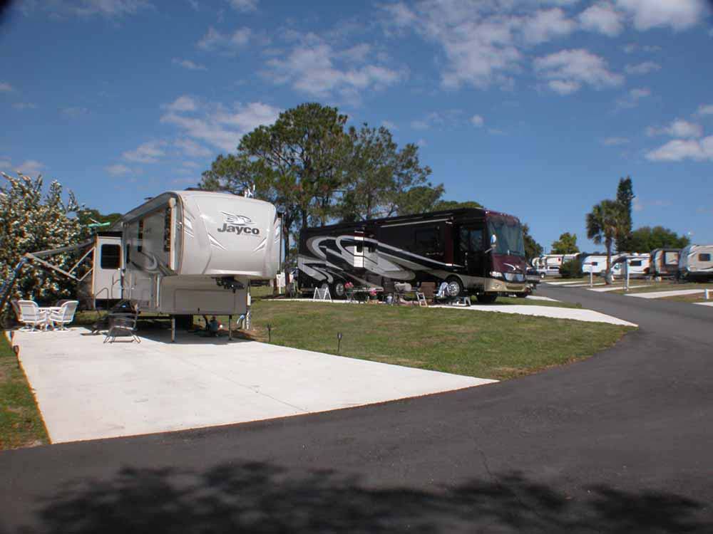 A view of parked RVs in their sites at FISHERMAN'S COVE RESORT