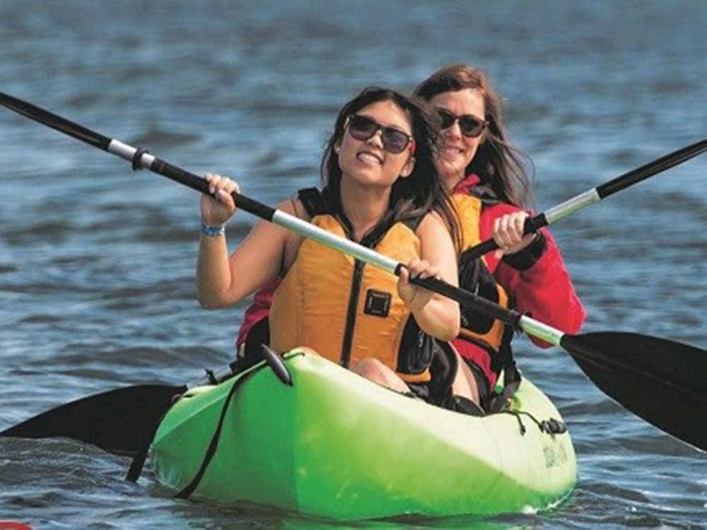 Two women in a kayak at NASHVILLE SHORES LAKESIDE RESORT