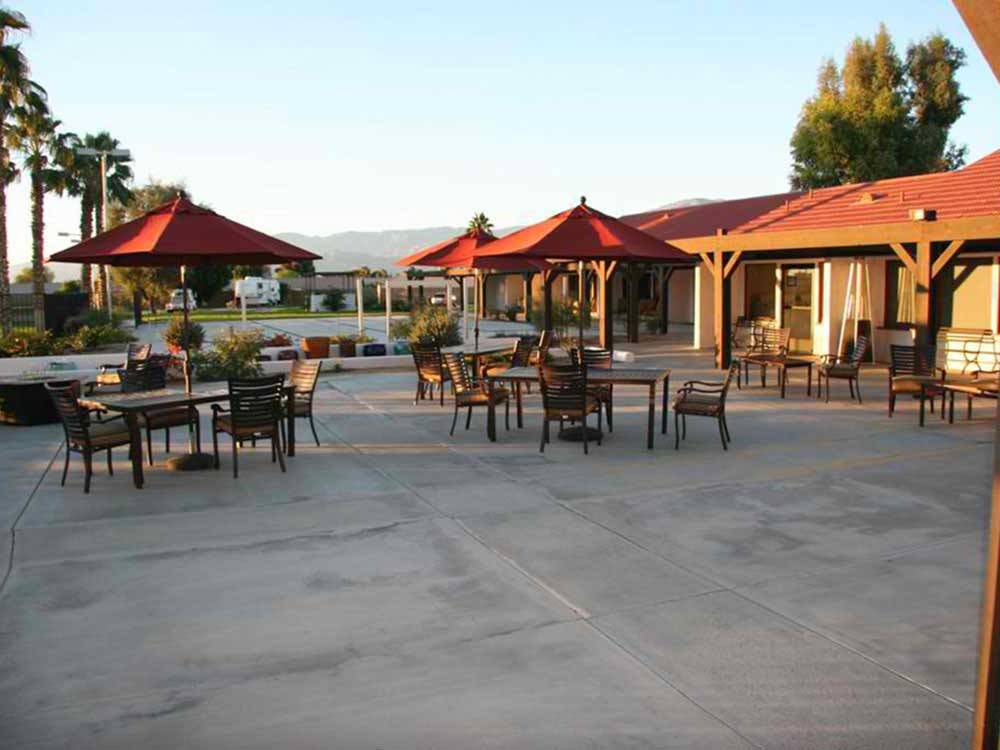 Patio area with seating at INDIAN WATERS RV RESORT & COTTAGES
