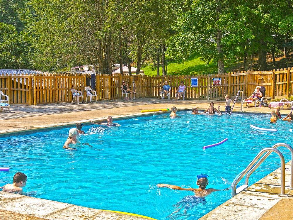 Campers swimming in the pool at THOUSAND TRAILS GREEN MOUNTAIN