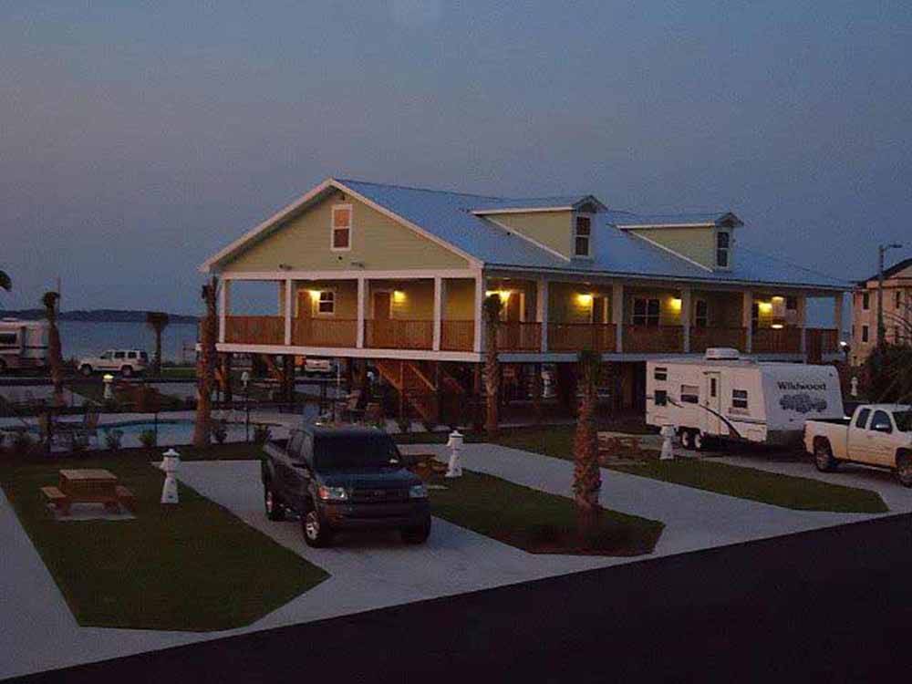 The paved back in sites at dusk at PENSACOLA BEACH RV RESORT