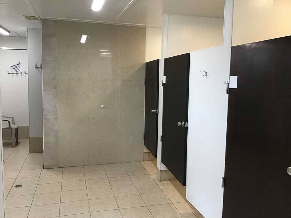 The clean restroom stalls at BEAVER RUN RV PARK