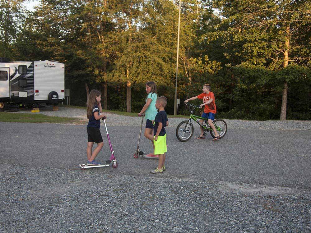 Kids playing on the road at SCENIC MOUNTAIN RV PARK & CAMPGROUND