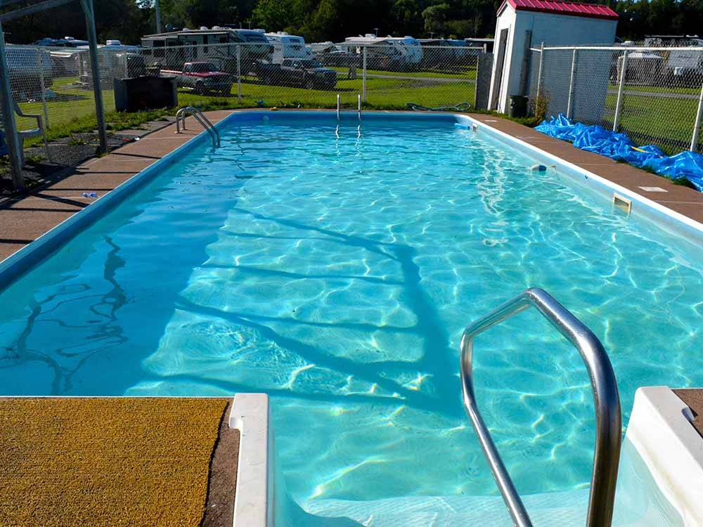 The swimming pool area at HARBOUR LIGHT TRAILER COURT & CAMPGROUND