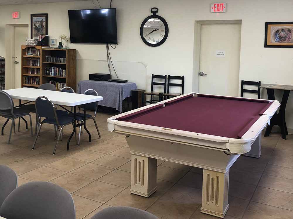 A pool table in the rec room at CRAZY HORSE RV CAMPGROUNDS