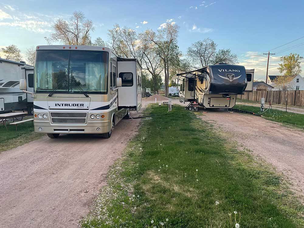 A couple of gravel pull thru sites at WAGONS WEST RV PARK AND CAMPGROUND