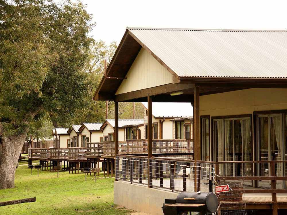 A row of rental cabins at RIO GUADALUPE RESORT