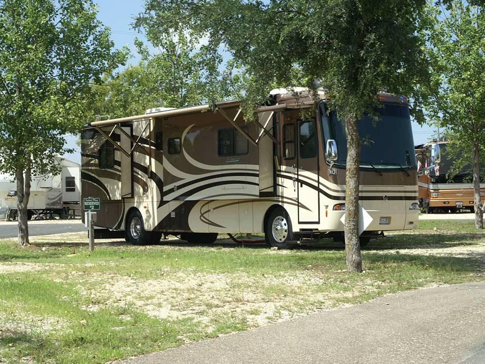 Class A Motorhome parked onsite at BLUE SKY I-35 RV PARK