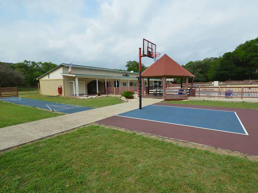The basketball & shuffleboard courts at SUMMIT VACATION & RV RESORT