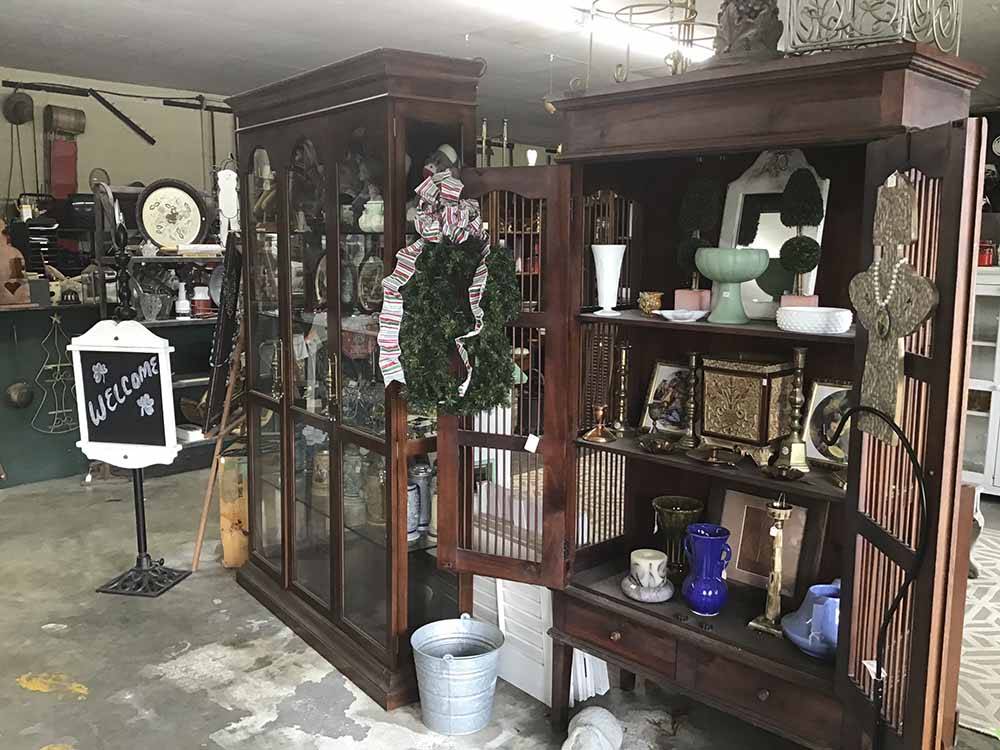 Shelves full of antiques at BILTMORE RV PARK