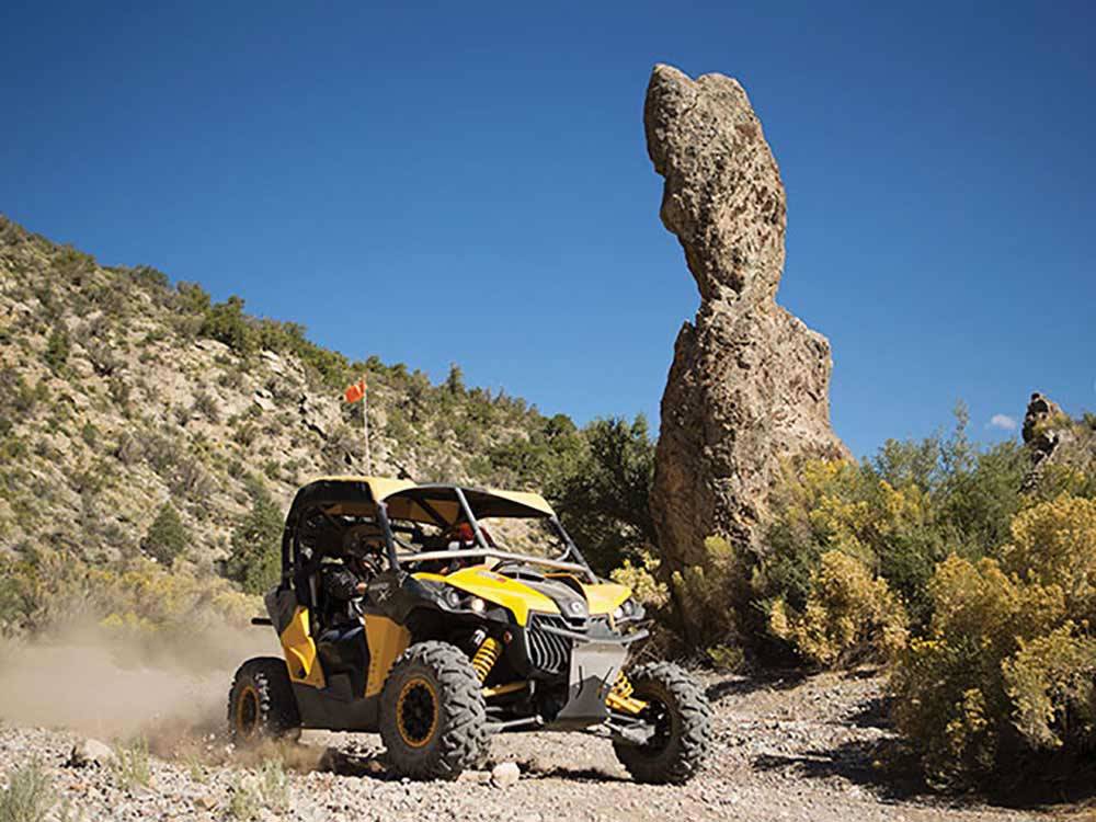 ATV driving near unique rock formation at PAHRUMP NEVADA