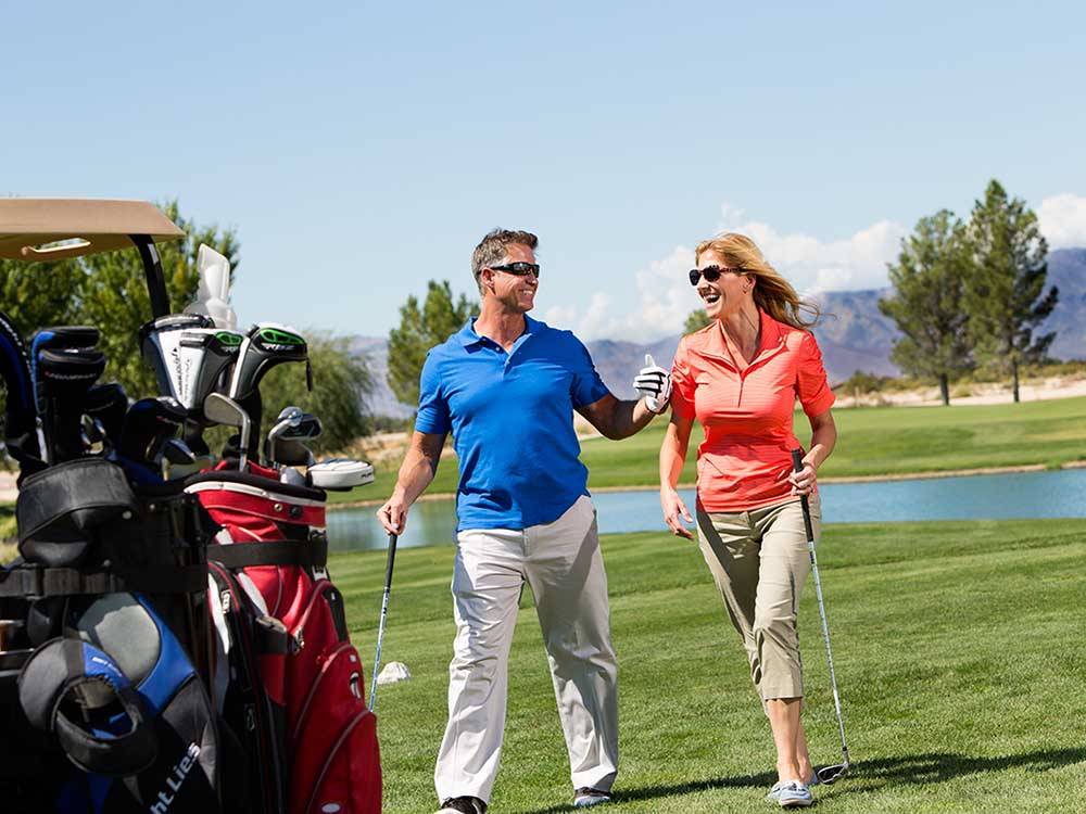 Couple enjoying golf together at PAHRUMP NEVADA
