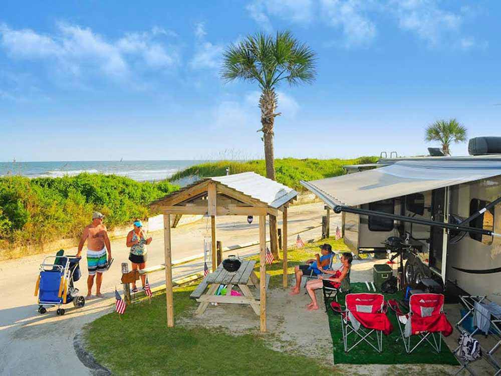 An RV campsite overlooking the ocean at MYRTLE BEACH CAMPGROUNDS