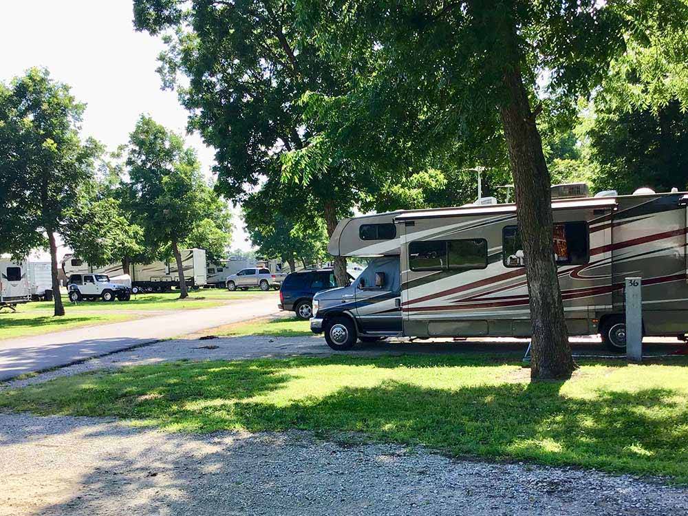 A row of shady RV sites at TULSA RV RANCH