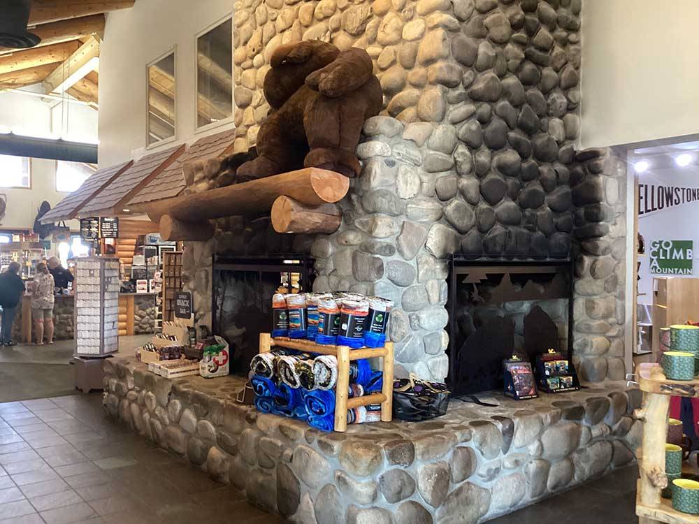 Stone fireplace near campground store at BUFFALO CROSSING RV PARK