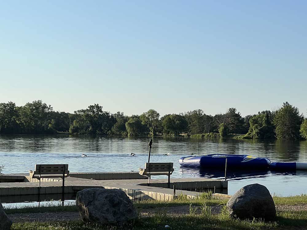 Large pier with observation areas near lake at SOARING EAGLE HIDEAWAY RV PARK