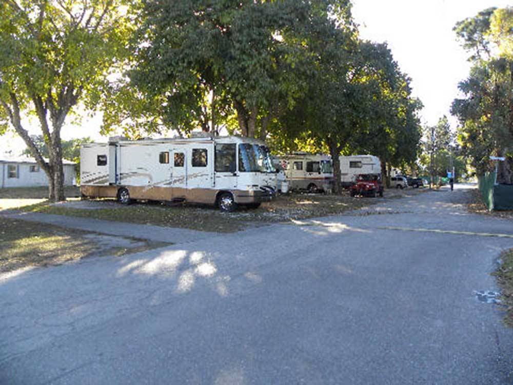A paved road between RV sites at LAZY J RV & MOBILE HOME PARK