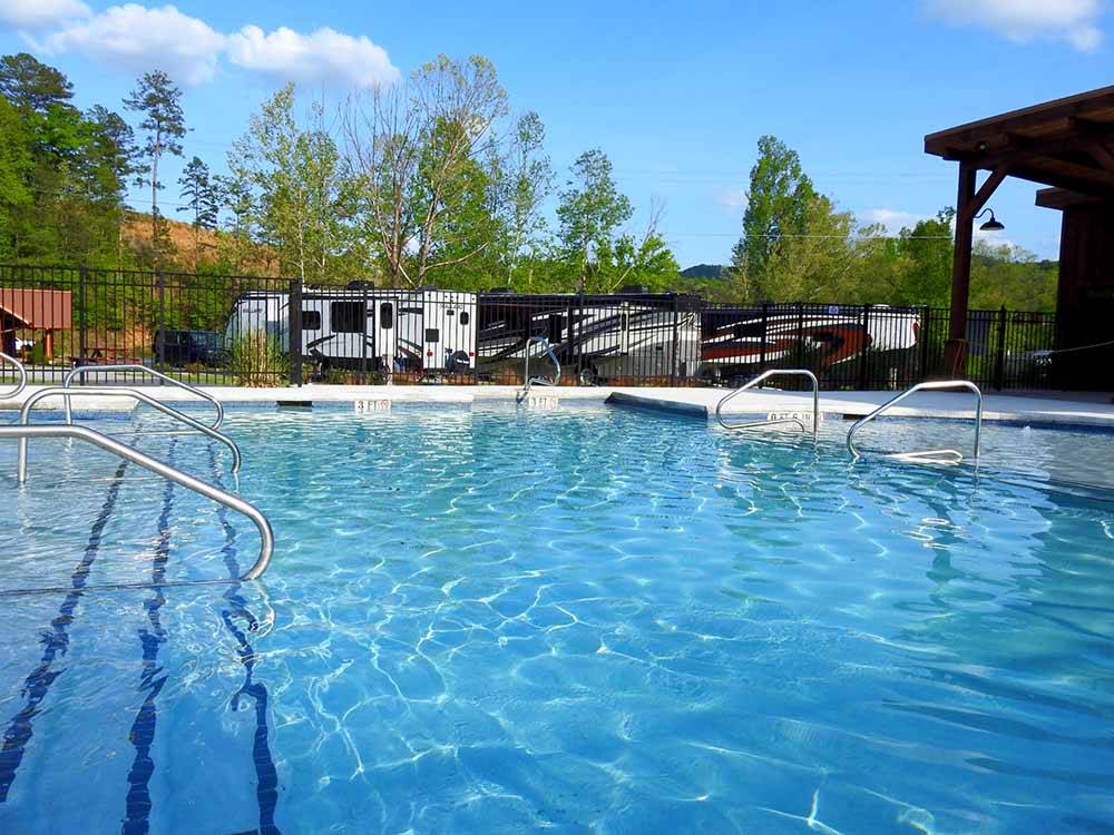 The swimming pool area at VALLEY RIVER RV RESORT