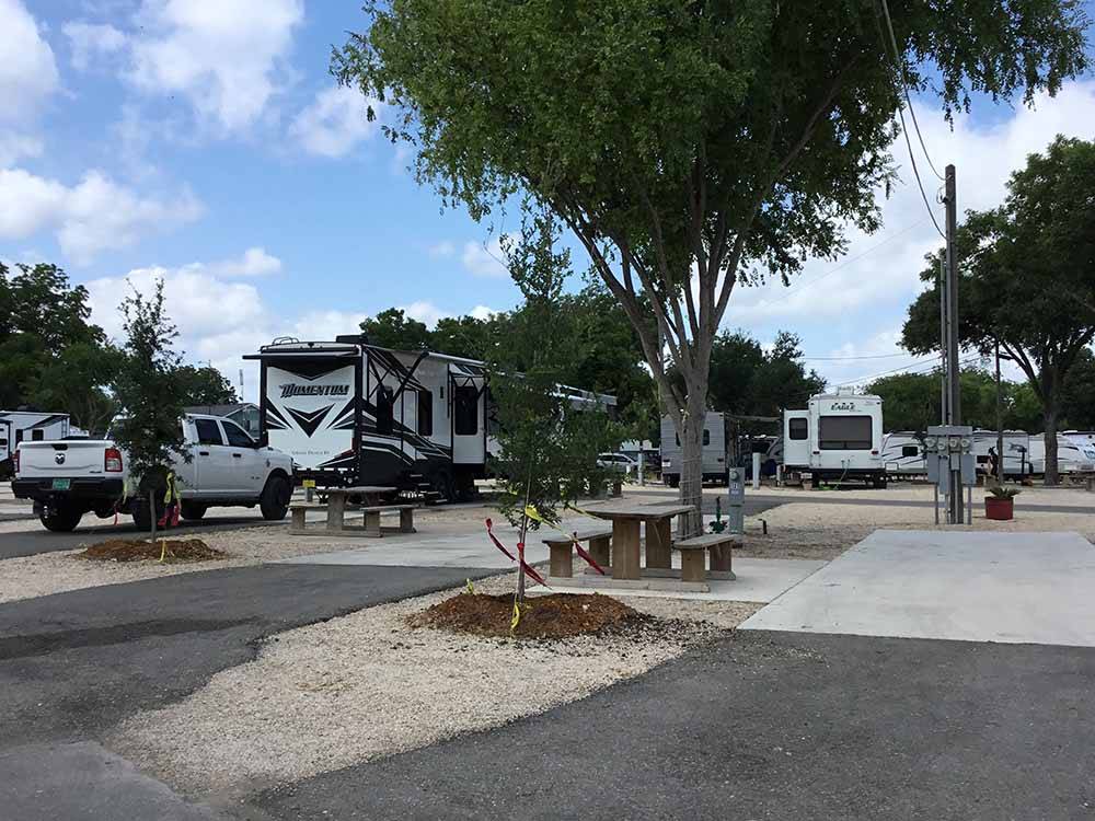 Two empty paved RV sites at MISSION CITY RV PARK