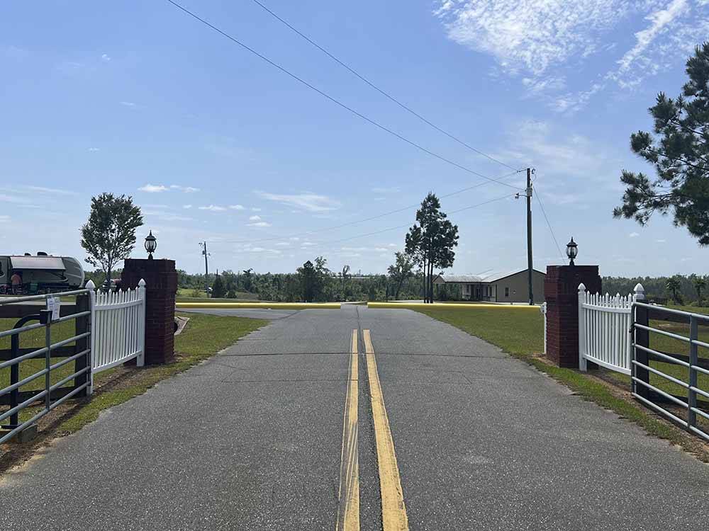 The front road and gate at ALLIANCE HILL RV RESORT