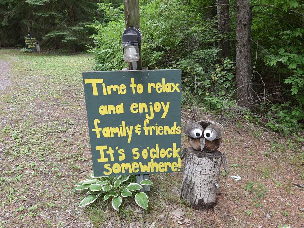 Fun sign posted at campground at MAPLEWOOD ACRES RV PARK