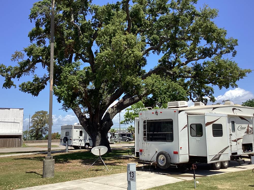 Fifth-wheel on paved site with satellite dish at BOOMTOWN CASINO RV PARK