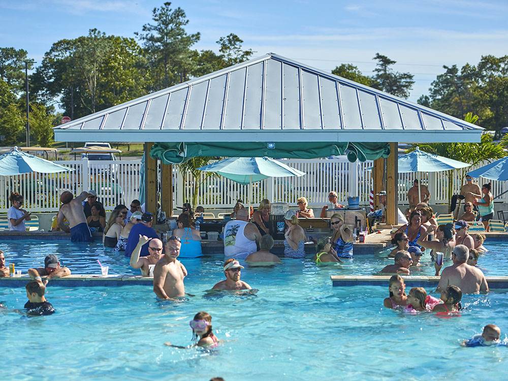 Guest enjoying the swimming pool at SUN OUTDOORS REHOBOTH BAY