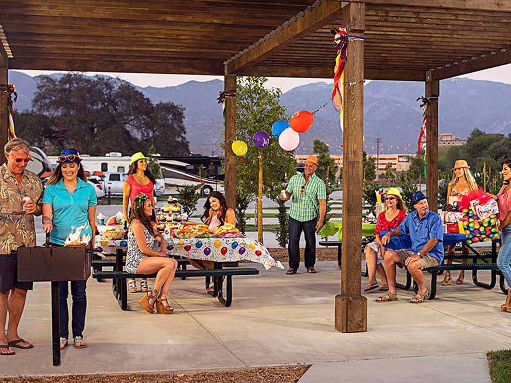 Patio area with picnic tables at PALA CASINO RV RESORT
