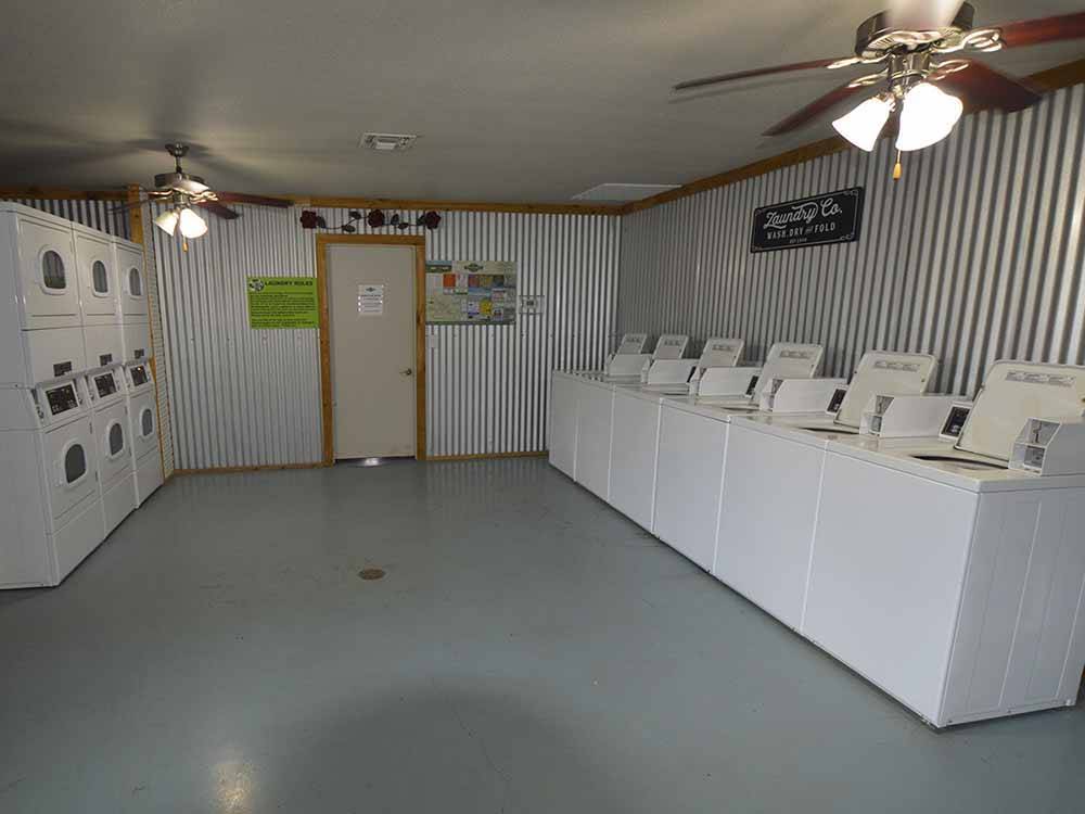 Inside of the large laundry room at THE VINEYARDS OF FREDERICKSBURG RV PARK
